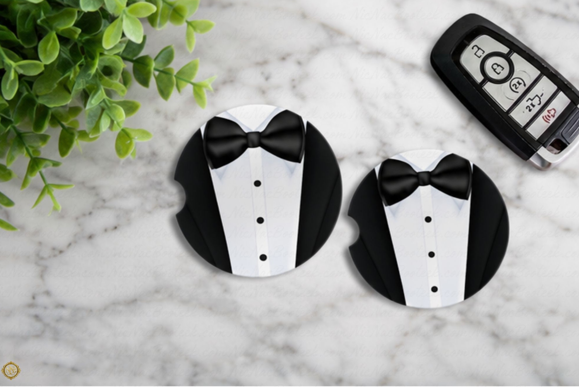 Gentleman’s Signature ceramic car coaster set styled on a white marble surface beside a vehicle key fob with sophisticated tuxedo and bowtie design.