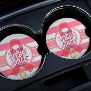 Pink ribbon breast cancer awareness car coaster set displayed inside vehicle cup holders with inspirational survivor support artwork.