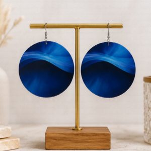 Midnight Wave Earrings featuring flowing sapphire-inspired artwork on oversized 3-inch round statement earrings with lightweight boutique styling by NicNacBooteek.
