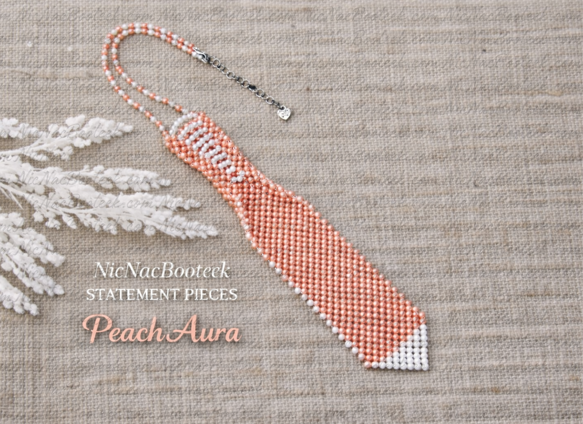 Peach Aura beaded necktie featuring handcrafted glass beads in soft peach and iridescent tones, with a structured, elegant finish.