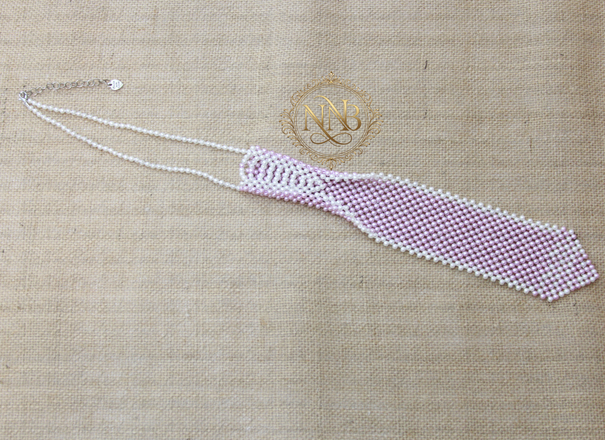 Full-length handwoven beaded necktie in Blush Skies colorway