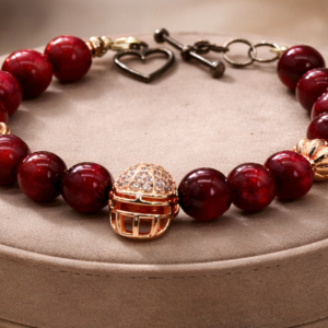 Rose Ascension bracelet displayed on beige suede pedestal with rose gold accents.