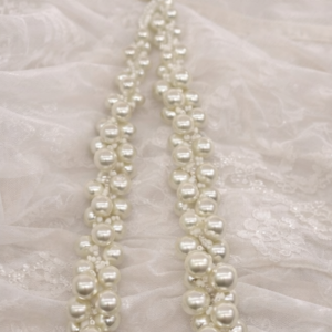 16.5 inch ivory pearl bridal collar necklace with graduated pearl cluster design with wedding shoes in background