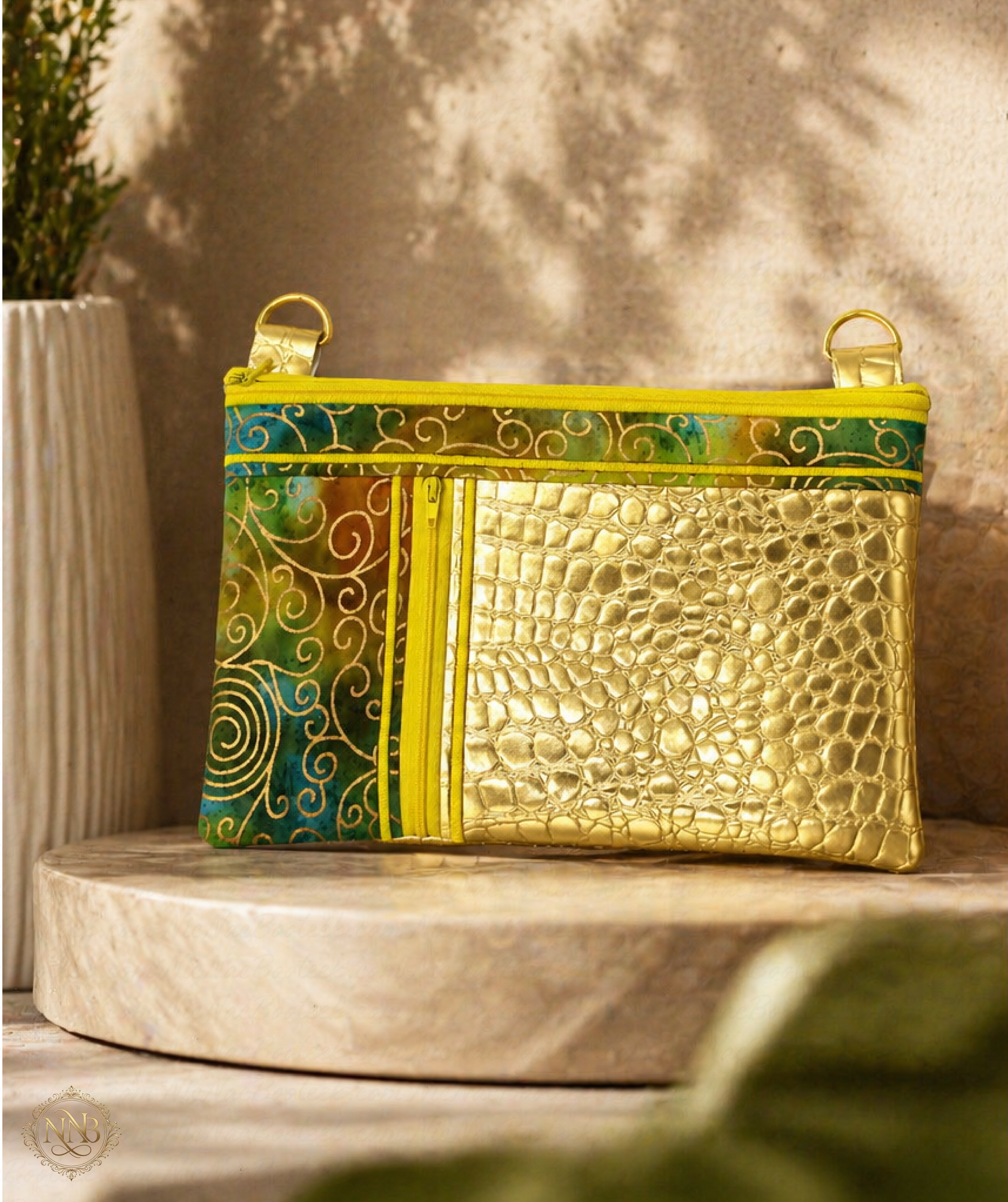 Gold and patterned crossbody wristlet front view luxury handmade bag