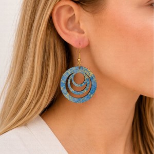 Model wearing Crescent Luxe Statement Earrings in a lightweight wooden crescent design