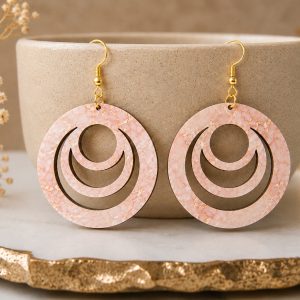 Crescent Luxe Statement Earrings in Blush Radiance featuring layered wooden crescent cutouts with blush marble-inspired artwork and gold-tone hardware