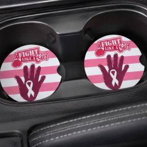 Breast Cancer awareness ceramic car coasters displayed inside vehicle cup holders.