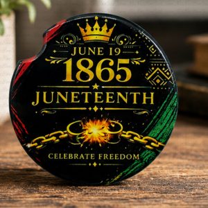 Luxury Juneteenth car coaster set displayed on rustic wood tabletop with gold lettering and vibrant heritage-inspired artwork