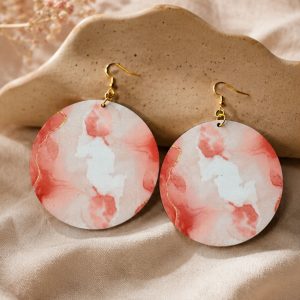 Rose Mist Statement Earrings styled on soft satin fabric featuring rose watercolor-inspired artwork and elegant gold-tone hooks by NicNacBooteek.
