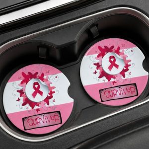 Survivor Pink Ribbon Car Coaster Set of 2 placed inside vehicle cup holders featuring pink ribbon breast cancer awareness ceramic coaster inserts.