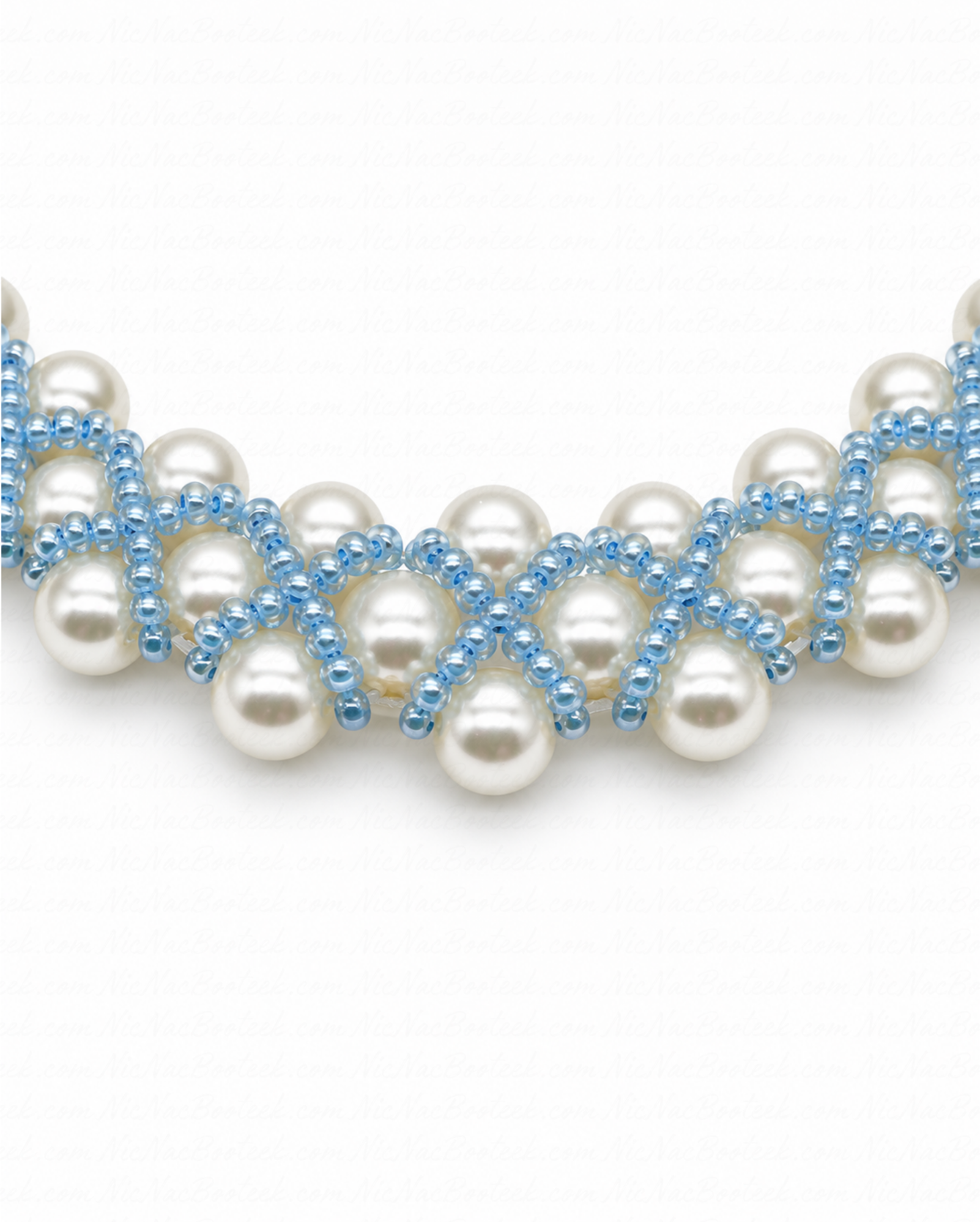 Close-up of Azure Veil something blue pearl bridal necklace showing cream glass pearls and pale blue seed bead weave